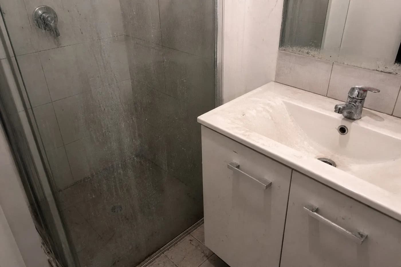 Dirty rental bathroom before bond cleaning