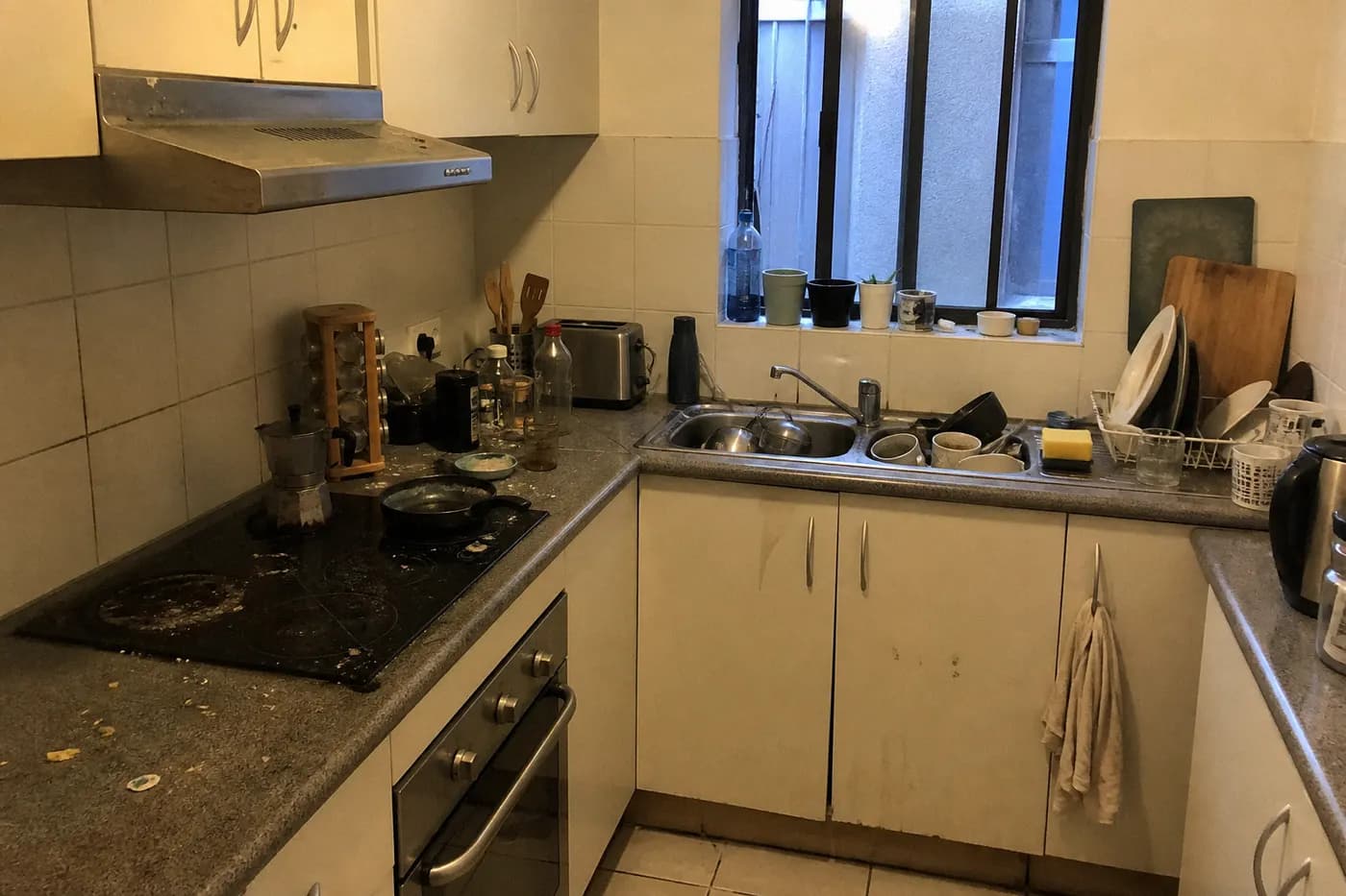 Messy rental kitchen before end of lease cleaning